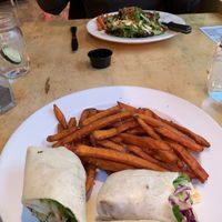 Quinoa salad wrap with sweet potato fries   at Solid Grill & Bar in Boise