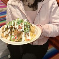 Best Nachos in Town! Got the Gluten Free Carnitas which had the best Consistency and their cheese just melts in your mouth!  at Doomie's NextMex - Vine in Hollywood