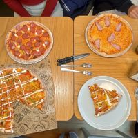 The big pizza is Large Superseitan pizza (V) at Kotipizza in Helsinki