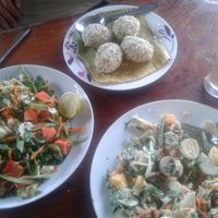 A creamy coconut salad, papaya salad and numnim pudding at Organic Vegetarian Food by Mrs. Pong in Koh Phangan