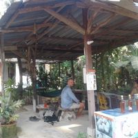 Outdoor sitting area  at Organic Vegetarian Food by Mrs. Pong in Koh Phangan