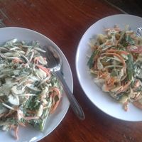 Green salad and mixed salad. Both raw and delicious with raw coconut dressing on top - ask for it raw if desired.  at Organic Vegetarian Food by Mrs. Pong in Koh Phangan