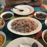 Dahl, eggplant curry, pumpkin curry, mushroom curry & home made mango chutney  at Bookworm Library Restaurant in Hikkaduwa