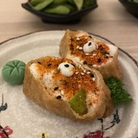 Spices inari I think! So delicious, we ordered more   at Sushi Kitchen in Petaling Jaya