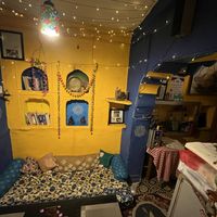 Floor cushion seating inside   at The Laughing Buddha Cafe in Pushkar