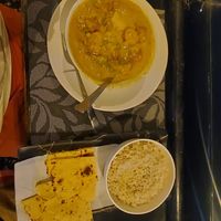 Sweet potato curry and brown rice, he can alos make chickpea flour chapati (gluten free) massive portions at The Laughing Buddha Cafe in Pushkar