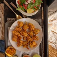Veg pakora and salad at The Laughing Buddha Cafe in Pushkar