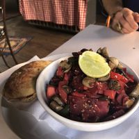 Salad bowl with homemade bread at The Laughing Buddha Cafe in Pushkar