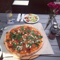 Vegan pizza with olives, mushrooms, sundried tomatoes, spinach, flaked almonds and pesto. at Cobblestone Joes in Limerick