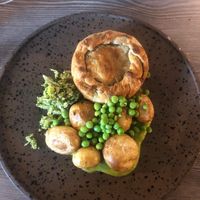 Brocolli & seitan pie, jersey royals and peas (main)   at The Cellar Door in Durham