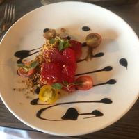 Compressed watermelon, balsamic, tomatoes, basil (starter)  at The Cellar Door in Durham