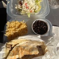 Vegan chicken supreme quesadilla with rice, black beans, and Mexican salad at Nacho Taco in Jacksonville