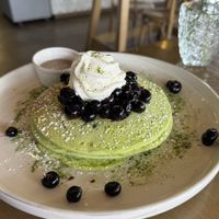 Blueberry matcha pancakes with lavender syrupp  at The Moth Cafe - Downtown in Edmonton