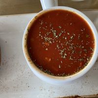 Fresh tomato soup (has tomato chunks but they are small)  at The Moth Cafe - Downtown in Edmonton