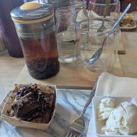 Vegan banana and chocolate cake served with vegan vanilla ice cream and fresh leaf early grey tea at Kibble Bakery in Skipton