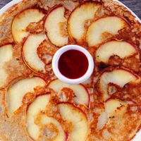Apple dutch pancake with strawberry jam at Pancakes - Prins Hendrikkade in Amsterdam