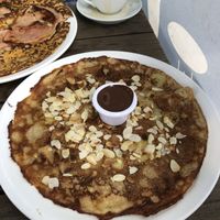 Bananas, almonds and chocolate sauce Dutch pancake! at Pancakes - Prins Hendrikkade in Amsterdam