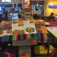 Menu with Mexican guy. at Sunrise Tacos in Bangkok