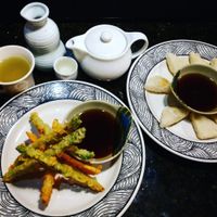 Vegan asparagus and sweet potato tempora with agedashi tofu, green tea and sake. at Zen of Sushi in Port St Lucie