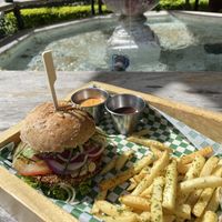 quinoa and bean burger with fries. sauces: bbq and chilli mayo  at La Bruja Vegan Foods in Antigua