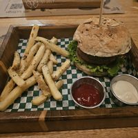 Beyond burger with fries at La Bruja Vegan Foods in Antigua