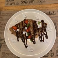Chocolate crepe with star berries + kiwi   at La Bruja Vegan Foods in Antigua