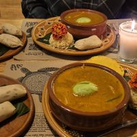 Pepian with tamales on the side at La Bruja Vegan Foods in Antigua