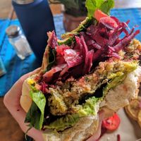 Lentil Burger - Avocado, Beets, Onions, Spinach, Mustard = Perfection.  at La Bruja Vegan Foods in Antigua