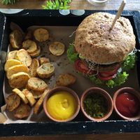 Huge lentil burger at La Bruja Vegan Foods in Antigua