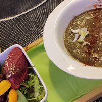 Creamy lentil soup with side salad with beetroot hummus. at Une Cuillère Pour Maman in Bergerac