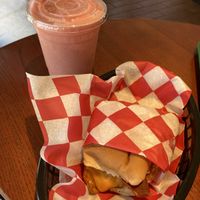 Egg chees sausage break sandwich n rare redu smoothy   at Santana's Vegan Grill in Colorado Springs