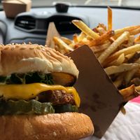 Omg!!! Deluxe cheeseburger and a HUGE fry!!! Sooo good!!!! at Santana's Vegan Grill in Colorado Springs