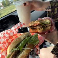 Vanilla milkshake thousand island burger and deluxe burger   at Santana's Vegan Grill in Colorado Springs