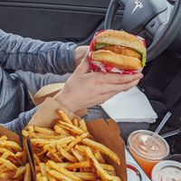 "Chicken" Sandwich, Fries, and Strawberry lemonade at Santana's Vegan Grill in Colorado Springs