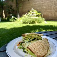 Eat in the peaceful garden behind Watson’s! Vegetarian sandwich on multigrain bread  at Watson's Veggie Garden in Visalia