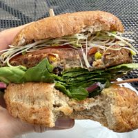Black bean burger on sprouted grain bun with greens, tomatoes, onion & sprouts (minus mayo). Delicious !  at Watson's Veggie Garden in Visalia