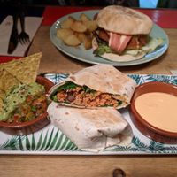 El Gringo burrito and in the background the American burger. at Floripa in Barcelona