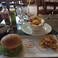 Veggie burger, tropical fruit salad and earl grey tea delicious   at Bar Cafe Restaurante Giroud J&J in Trinidad