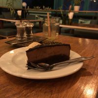 Chocolate cake. Ice cream hidden behind.  at Green-Go Garden in Siem Reap