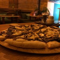 The best way to end a lovely dinner. Pizza topped with vegan Nutella, banana and nuts.  at Green-Go Garden in Siem Reap