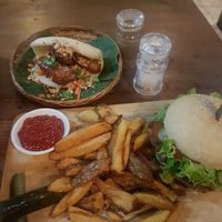 Veggie burger with lentil patty and tofu bao bun at Small Time Cooks in Abang