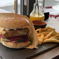 Tempe Burger and orange juice  at Green Farm Cafe  in Kutchan