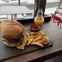 Tempe Burger and orange juice  at Green Farm Cafe  in Kutchan