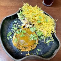 Heart of palms, corn, apple salad with potato sticks and a chickpea burger topped with jam. So good! at Prana Vegetariano - JB in Rio De Janeiro