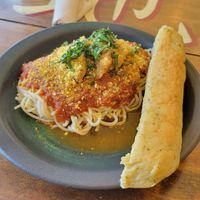 Homemade pasta and marinara topped with tofu "chicken" & breadstick at Baker Creek Heirloom Seed in Mansfield
