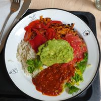 Bowl with rice, veggies, lentils, salad, pico, guacamole (costs extra) and hot sauce at Chupenga - Gendarmenmarkt in Berlin