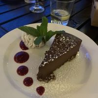 Vegan bourbon chocolate tort cake ! at Plum Pt. Bistro in Saunderstown