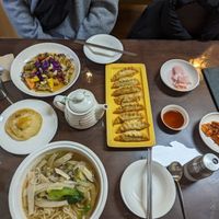 Clockwise from top left: vegan sweet and sour pork, dumplings, pink radish, kimchi, mushroom soup, vegan fried egg. at Oh Se Gae Hyang - 오세계향 in Seoul