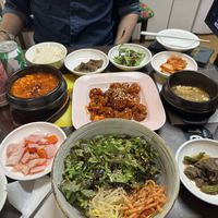 Bibimbap, spicy tofu stew, variety of banchan, and sweet and spicy fried chicken (s size)  at Oh Se Gae Hyang - 오세계향 in Seoul