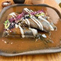 Enchiladas.  It tasted good.  I just wished they were stuffed with something.  Everything you see on top is what’s to be enjoyed with these enchiladas  at Hierba Dulce in Oaxaca